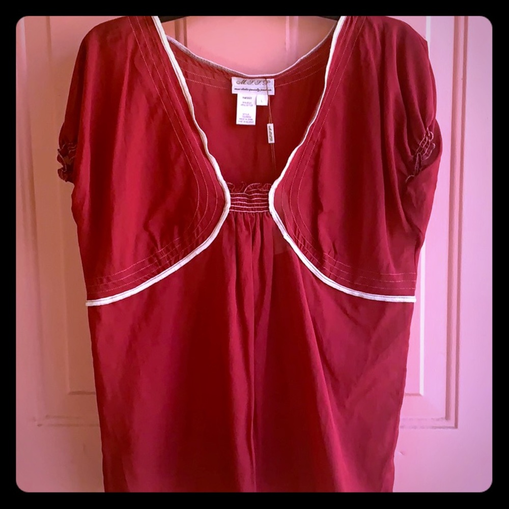 Mac Studio red top with cream detailing